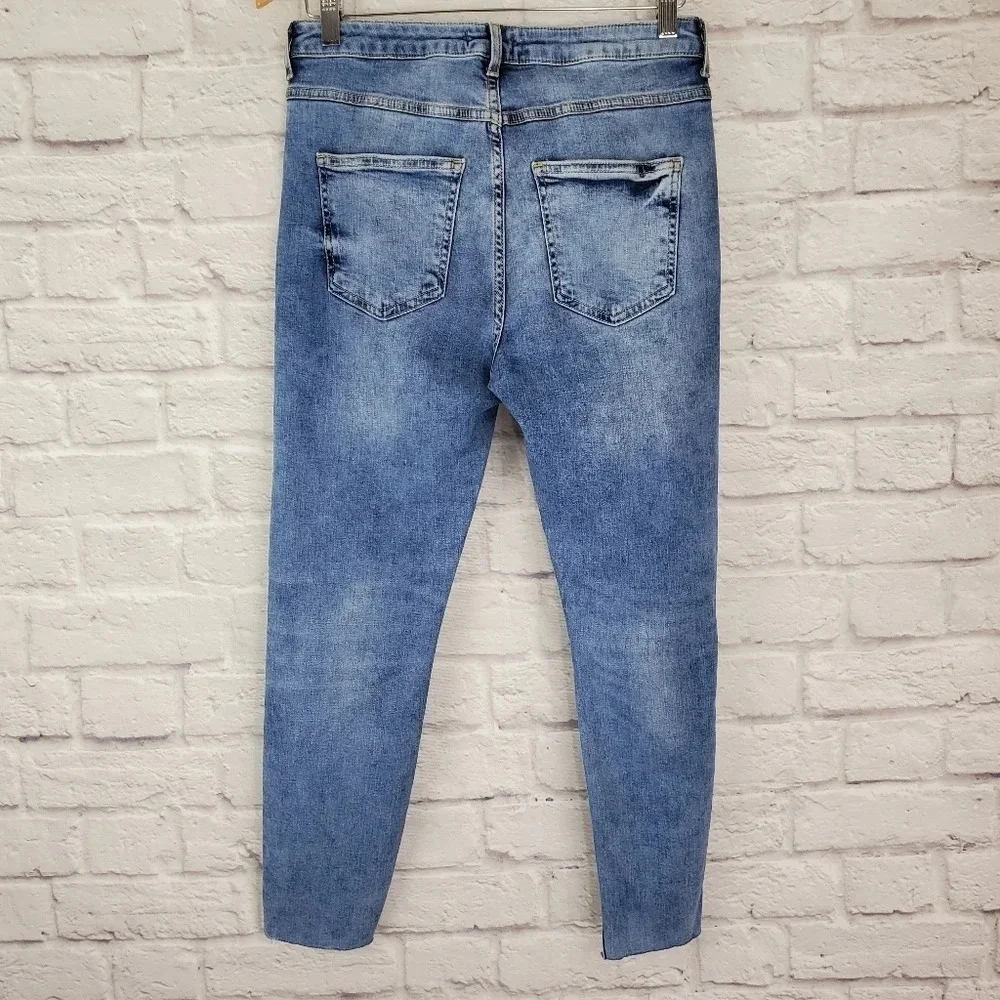 Forever 21 Distressed Step Hem High Rise Jeans